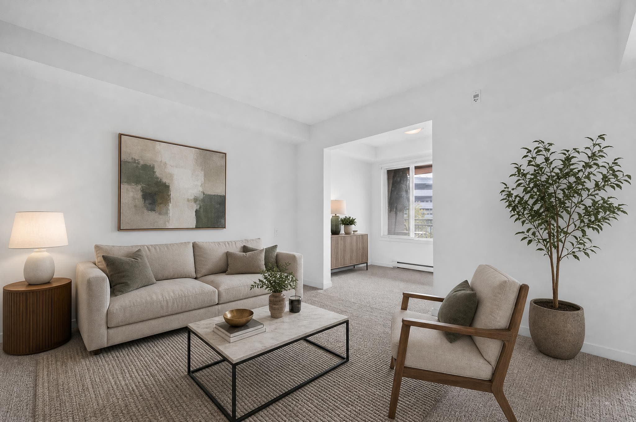 Living and dining room furnished in a restrained modern style
